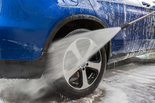 Car Washing. Cleaning Car Using High Pressure Water. Autowashing outdoors